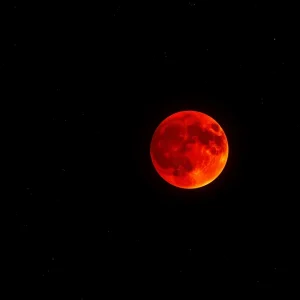 Blood moon during a total lunar eclipse over Kansas City